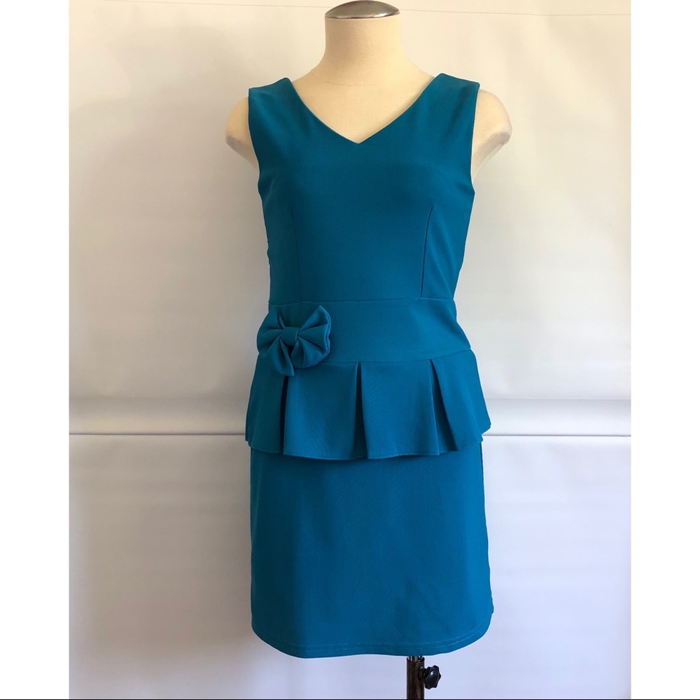 Petite friendly Peplum Dress Size: XS